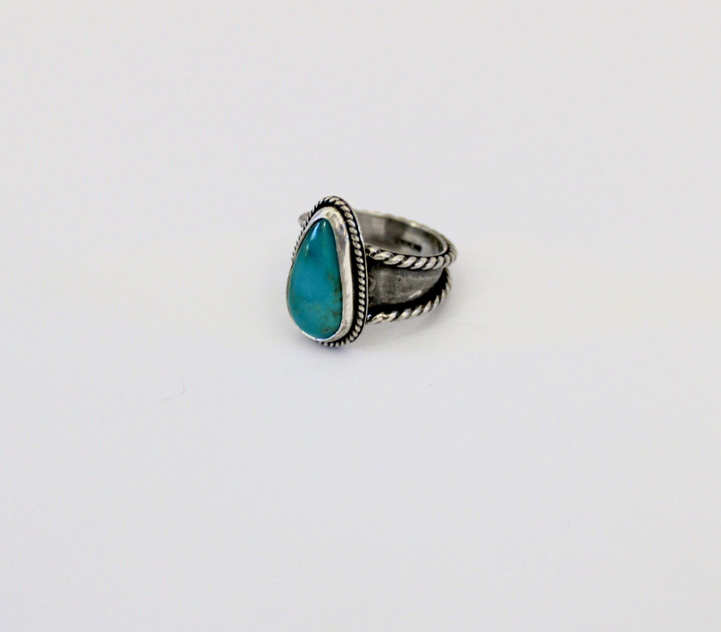 Royston Turquoise Ring with roped border- size 7.5