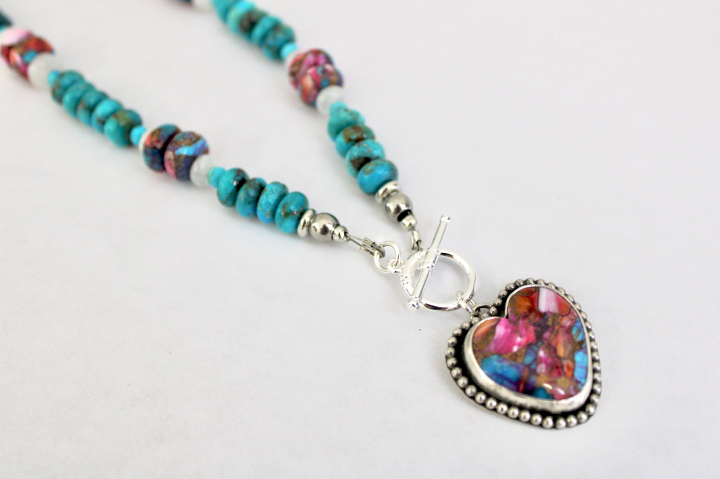 Pink Dahlia Turquoise toggle necklace on Kingman and Pink Dahlia beaded chain