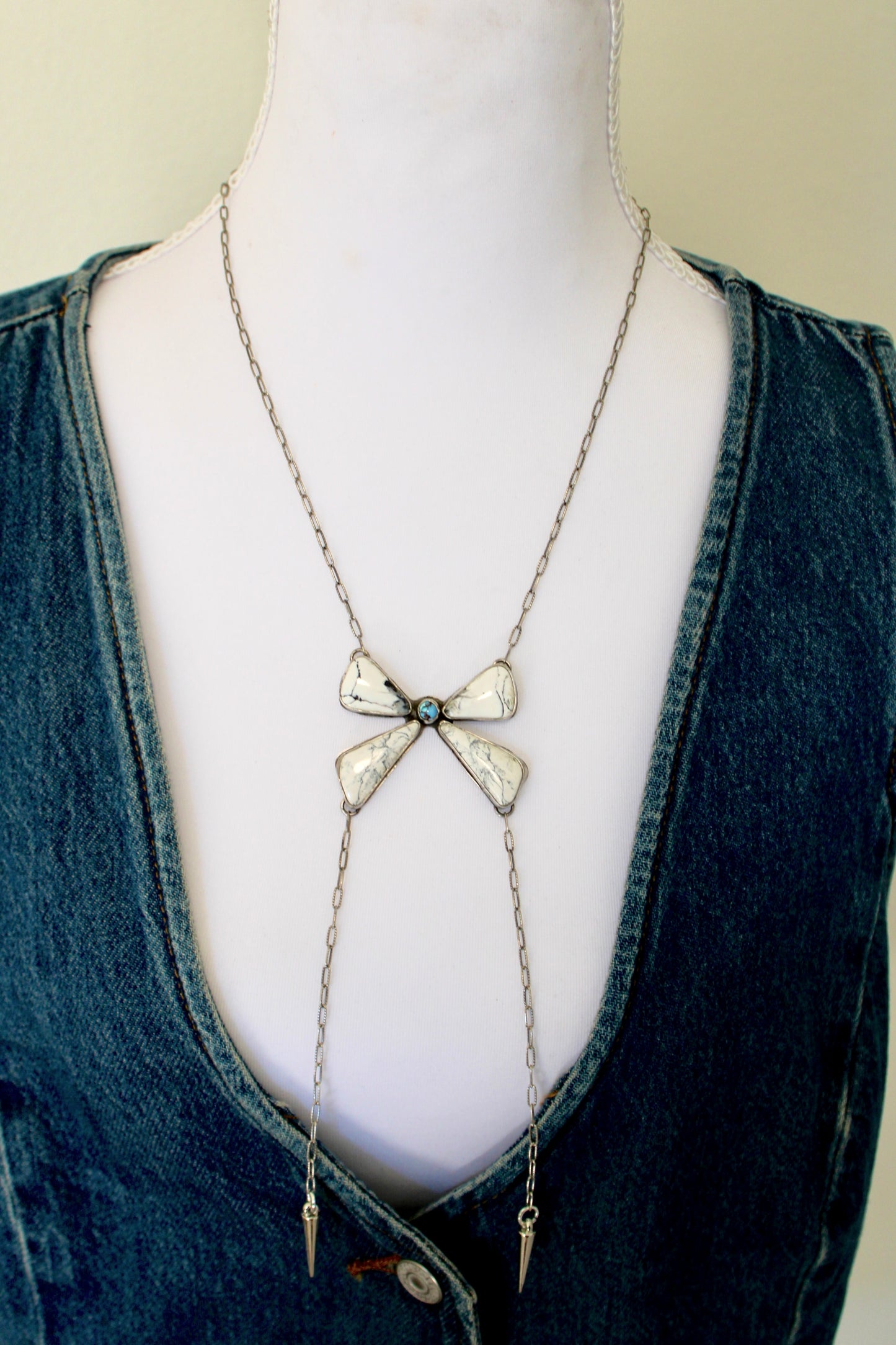 White Buffalo Bow with Golden Hills Necklace